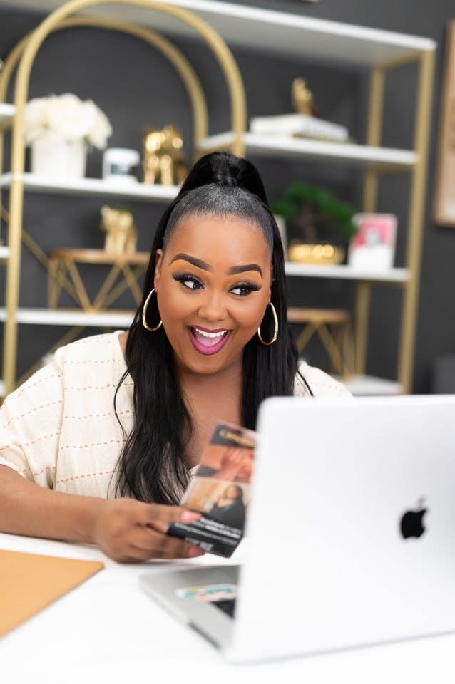 Candice at her desk, coaching through real accounts